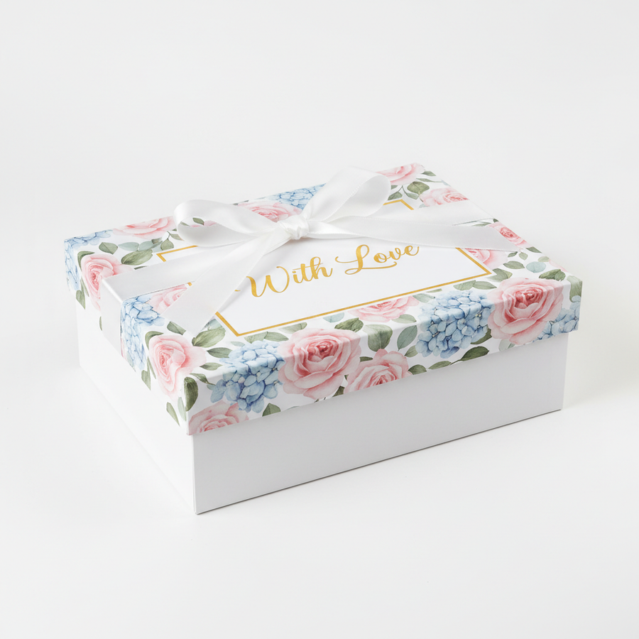 White rigid gift box with custom floral pattern lid and With Love gold foil text with satin ribbon bow on white background