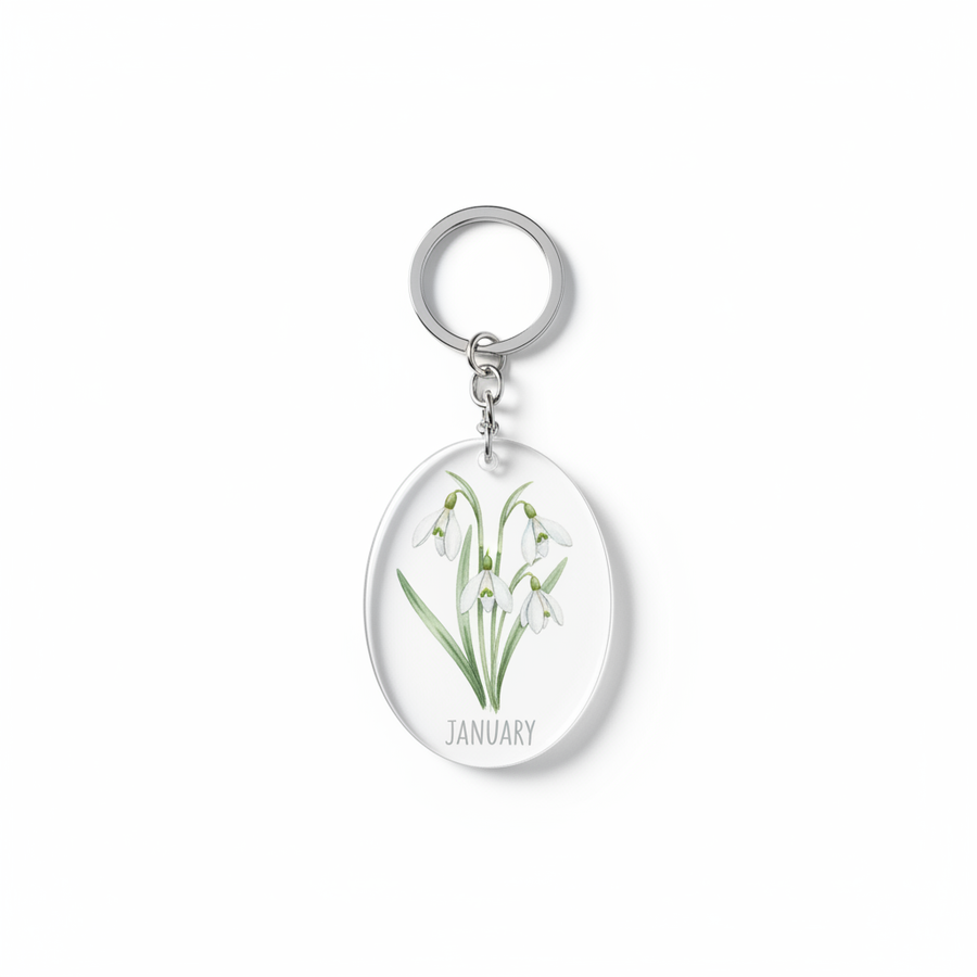 Acrylic keychain with watercolor birth flower snowdrop illustration and birth month text on white background