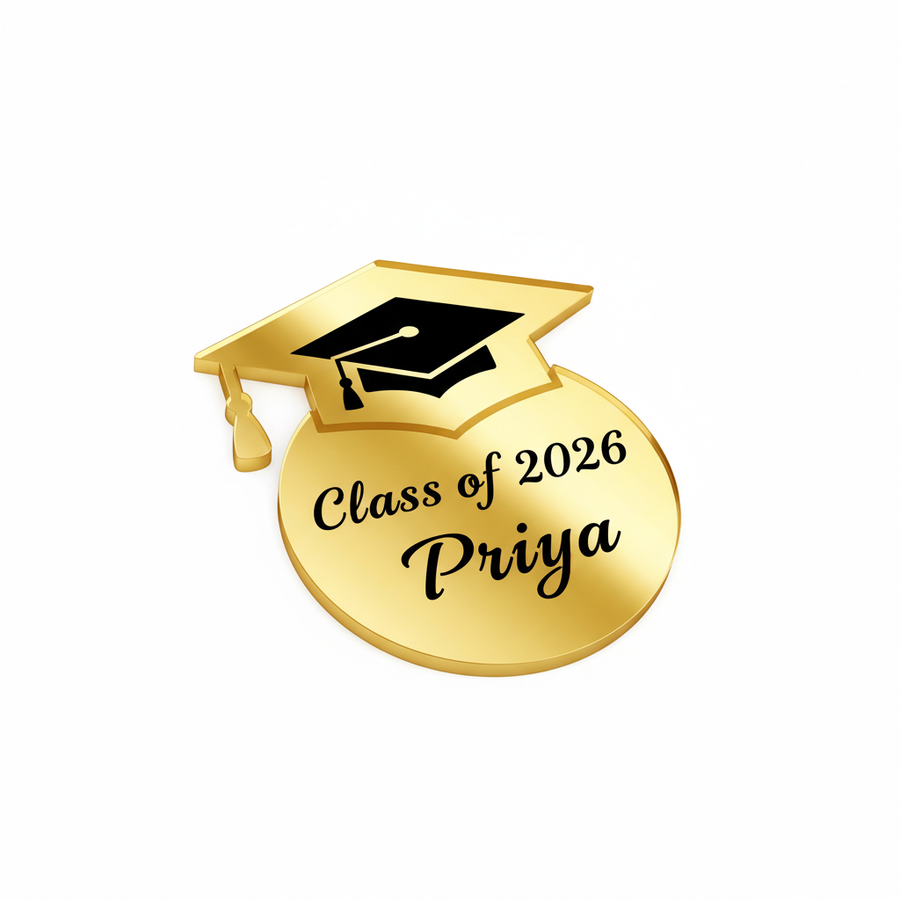 Gold acrylic keychain with graduation cap icon and Class of 2026 with name PRIYA in elegant font on white background